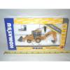 Komatsu WB146 Backhoe/Loader With Work Tools By First Gear 1/50th Scale #1 small image