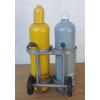 Linde Acetylene/Corgon Schnapps bottles on hand trucks - Decorational object