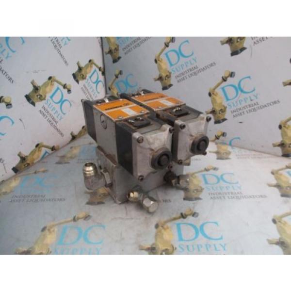 REXROTH 4WE10G21/AW110NZ4V 4 WAY SOLENOID VALVES WITH MANIFOLD ASSEMBLY #1 image