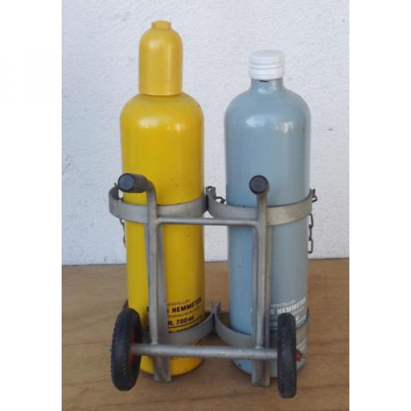 Linde Acetylene/Corgon Schnapps bottles on hand trucks - Decorational object #3 image